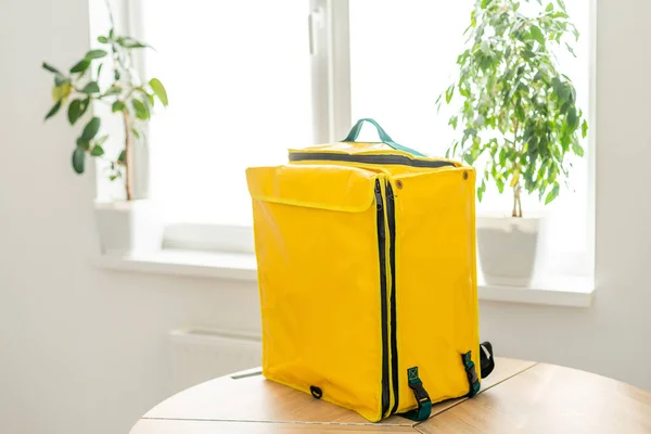 Yellow refrigerator bag for food delivery or for trip to nature and tourism. Thermo bag that keeps food from spoiling