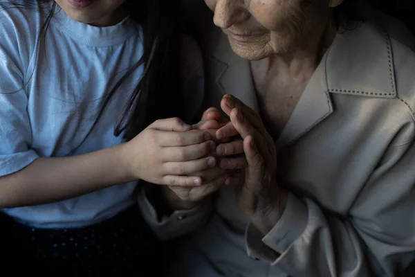 Portrait of a great-grandmother, great-granddaughter, close-up — Stock Photo, Image