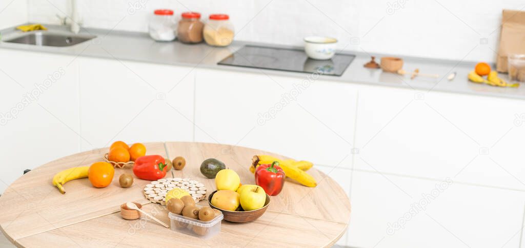 healthy foods are on the table in the kitchen