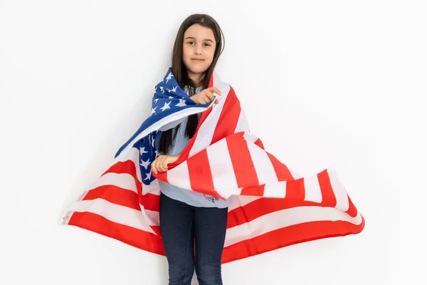 Patriotic holiday. Happy kid, cute little child girl with American flag. USA celebrate 4th of July. — Stock Photo, Image