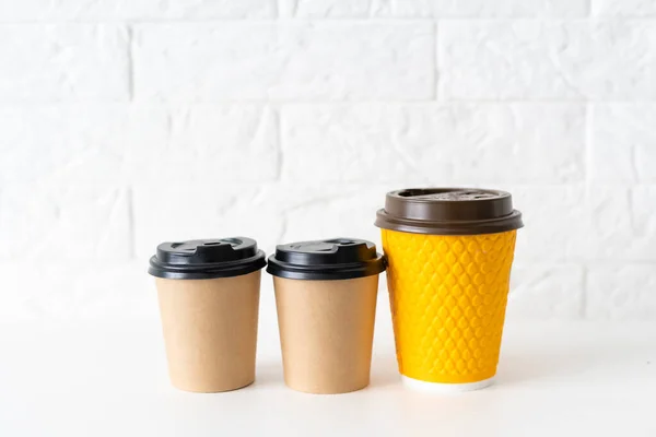 Disposable paper coffee cup on white background with clipping path. Collection