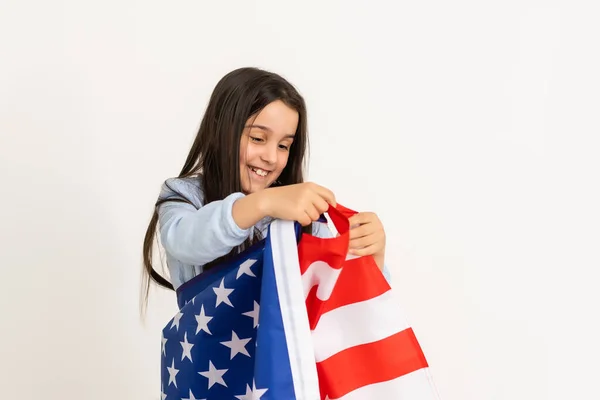 Mała dziewczynka świętuje nam dzień niepodległości — Zdjęcie stockowe