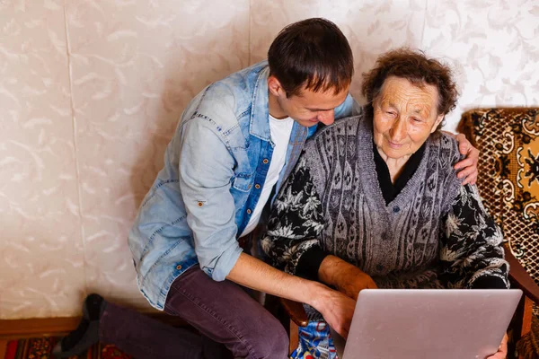 Picture of a senior woman and a young man — Stock Photo, Image