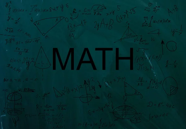 Handwritten equations on a green blackboard — Stock Photo, Image