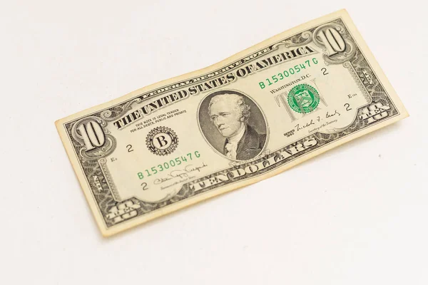 Beyaz arka plandaki dolar banknotunu kapat