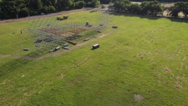 Installation of a stage for a concert in the park. Aerial view — Stock Video