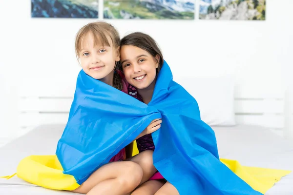 Children carry fluttering flag of Ukraine. Ukraines Independence Day. Flag Day. Constitution day. Girls with flag of Ukraine — Stock Photo, Image