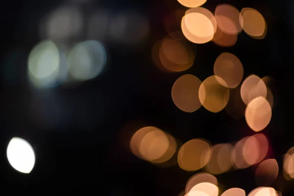 Kerst achtergrond. Feestelijke elegante abstracte achtergrond met bokeh lichten en sterren — Stockfoto