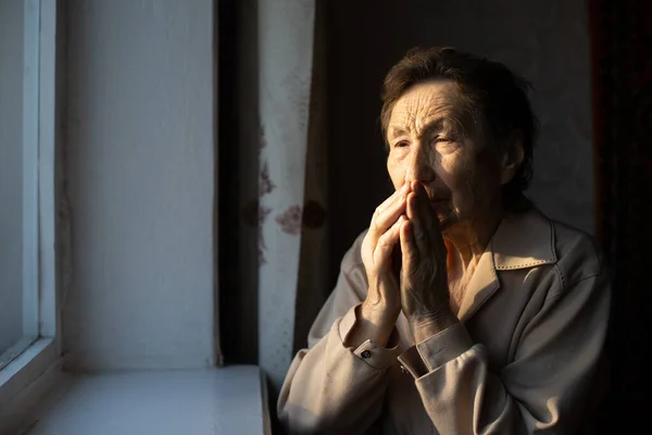 Beautiful over very old woman at home near the window — Stock Photo, Image