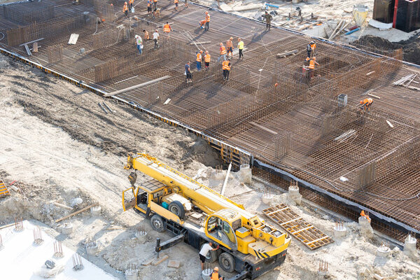 The huge metal structure on the construction site, aerial view