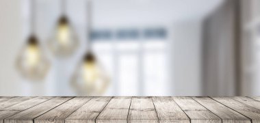 Tezgahın önündeki ahşap masa üstünde ampul vardı. Montaj ürünü görüntüleme veya tasarım anahtarı görsel düzeni için arkaplan.