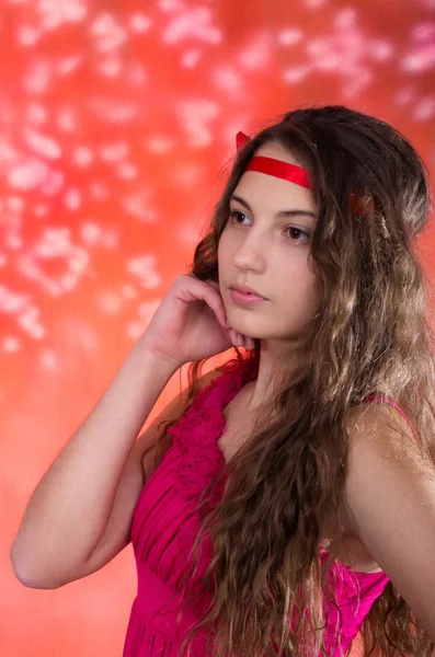 Beautiful teen girl in red dress — Stock Photo, Image