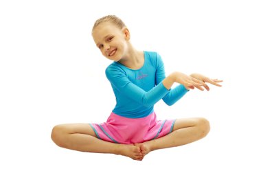 genç kız jimnastik egzersizleri yapıyor