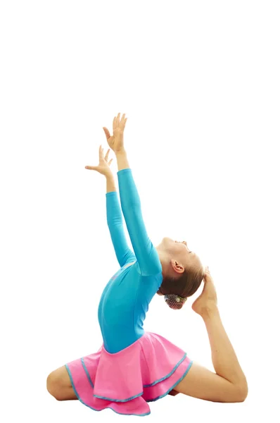 Chica joven haciendo ejercicios de gimnasia — Foto de Stock