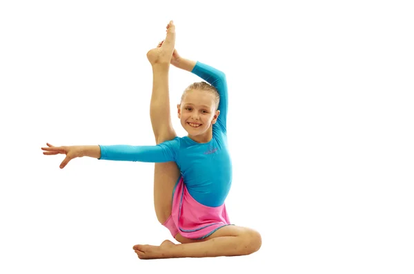 Young girl doing gymnastics exercises — Stock Image Young girl doing gymnastics exercises Royalty Free Stock Photos