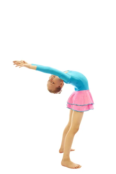 Chica joven haciendo ejercicios de gimnasia — Foto de Stock