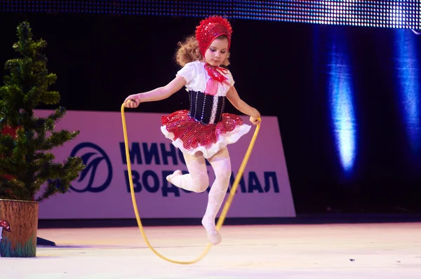 MINSK, BELARUS DECEMBER 05: unidentified gymnast from ' Slonim' participate with 'Little Red Riding Hood'  in 'Baby Cup - BSB Bank' children's competitions in gymnastics , 05 December 2015 in Minsk, B — Stock Photo, Image