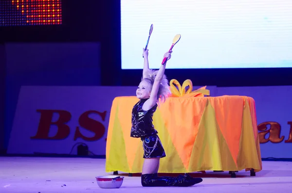 MINSK, BELARUS DECEMBER 05: Bozhko Bogdana from ' USiT' participate with 'Drum'  in 'Baby Cup - BSB Bank' children's competitions in gymnastics , 05 December 2015 in Minsk, Belarus. — ストック写真