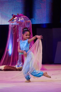 MINSK, BELARUS DECEMBER 05: Ariana Novikova from ' Lithuania, Klaipeda' participate with 'Magic Dream Jasmine'  in 'Baby Cup - BSB Bank' children's competitions in gymnastics , 05 December 2015 in Min