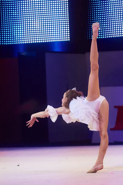 MINSK, BELARUS DECEMBER 05: Gerasimenok Ekaterina from ' USiT' participate with 'Cinderella'  in 'Baby Cup - BSB Bank' children's competitions in gymnastics , 05 December 2015 in Minsk, Belarus. — 图库照片