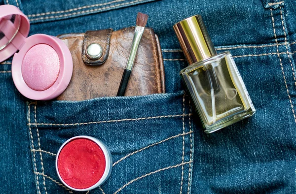 Jeans, cash and lipstick — Stock Photo, Image
