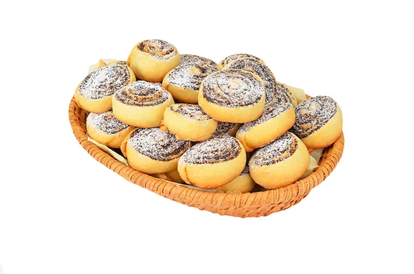 Homemade cookie roll with poppy in a wattled basket — Stock Photo, Image