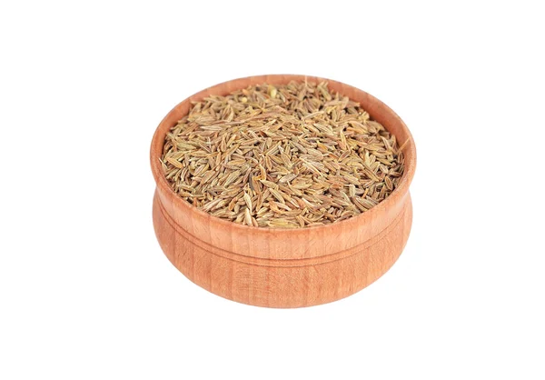 Cumin in wooden bowl — Stock Photo, Image