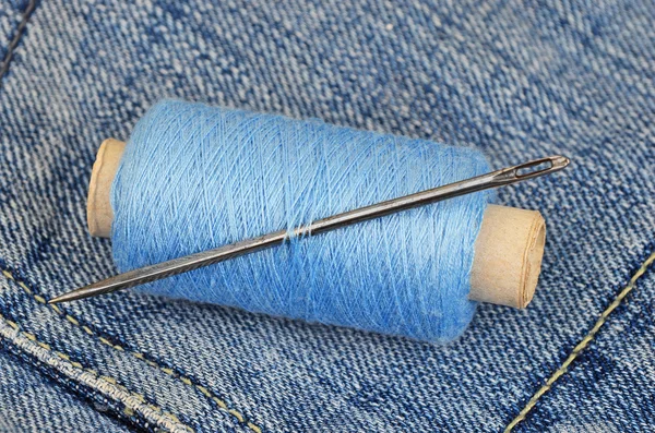 Threads on jeans backround — Stock Photo, Image