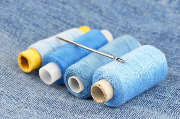 Threads on jeans backround — Stock Photo, Image