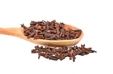 Clove in wooden spoon