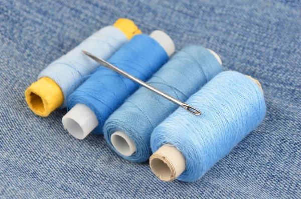 Threads on jeans backround — Stock Photo, Image
