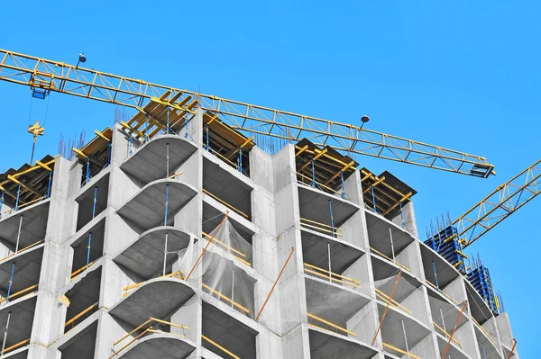 Crane and highrise construction site — Stock Photo, Image