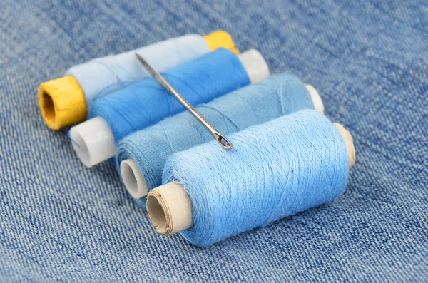 Threads on jeans backround — Stock Photo, Image