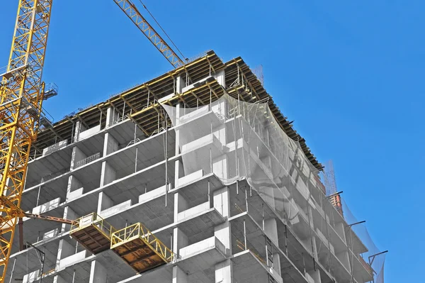 Crane and highrise construction site — Stock Photo, Image