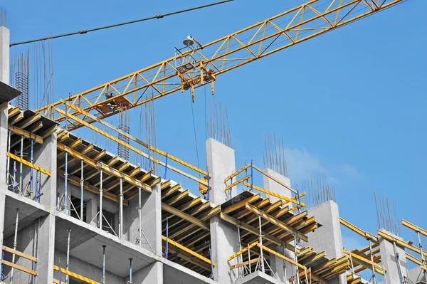 Crane and highrise construction site — Stock Photo, Image