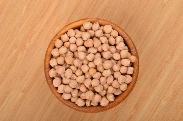 Chickpea in wooden bowl — Stock Photo, Image