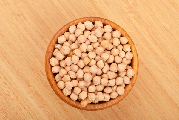 Chickpea in wooden bowl — Stock Photo, Image