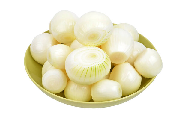 Peeled fresh white onion on plate, isolated