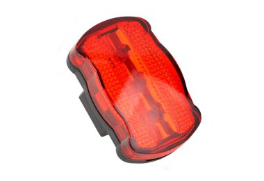 Kırmızı ışık bisiklet yansıtıcısı, beyaz arkaplanda izole.