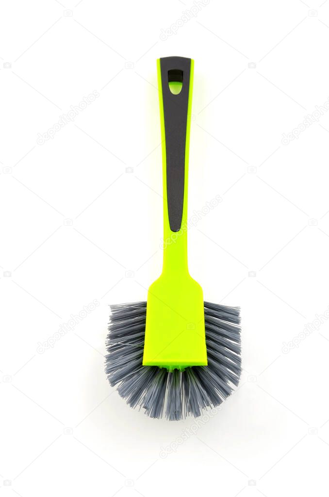 Plastic brush for cleanup, isolated on white background