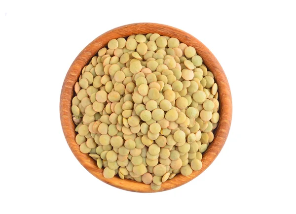 Green lentil in wooden bowl — Stock Photo, Image