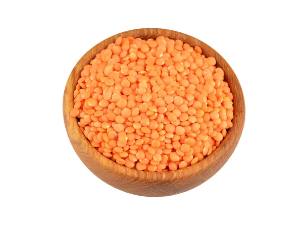 Red lentil in wooden bowl — Stock Photo, Image