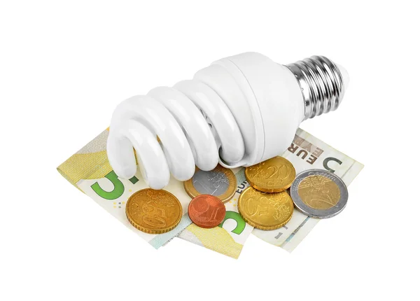 Energiebesparende lamp en geld — Stockfoto