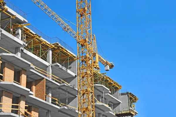 Crane and construction site — Stock Photo, Image