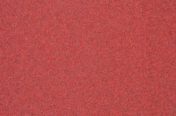 Roter Schleifpapier Hintergrund — Stockfoto