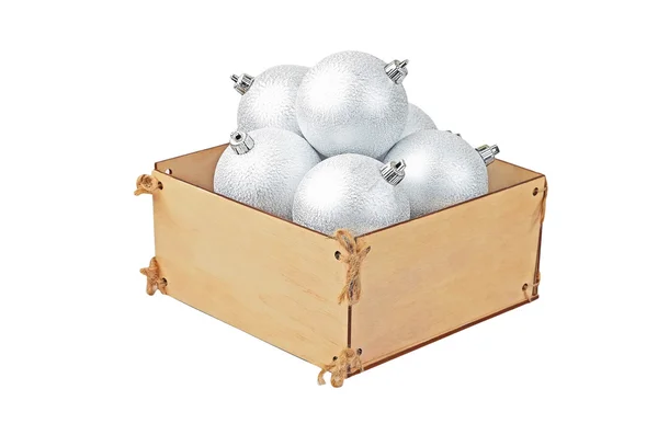 Wooden box with christmas baubles — Stock Photo, Image