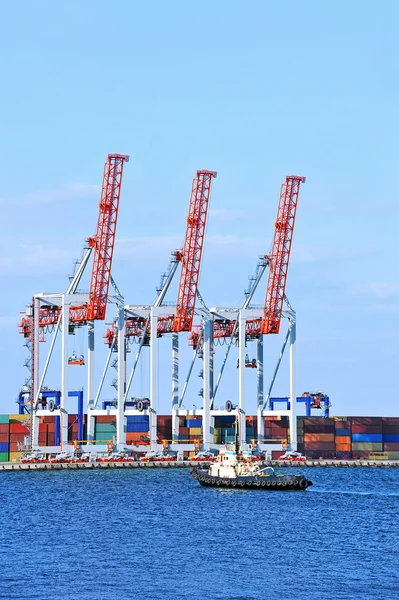 Tugboat and port cargo crane — Stock Photo, Image