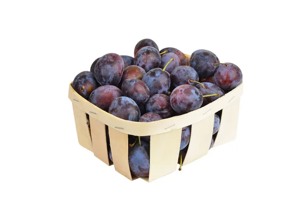 Plum in a wattled basket — Stock Photo, Image