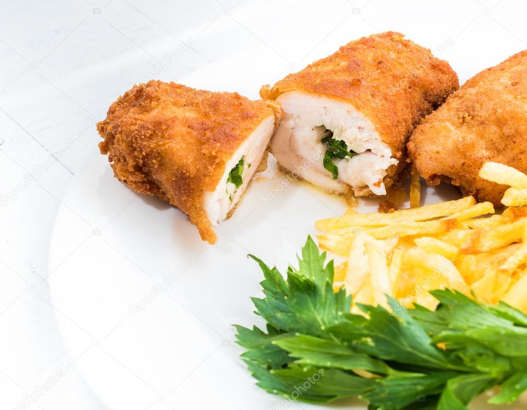 Chicken Kiev with roasted potatoes 8