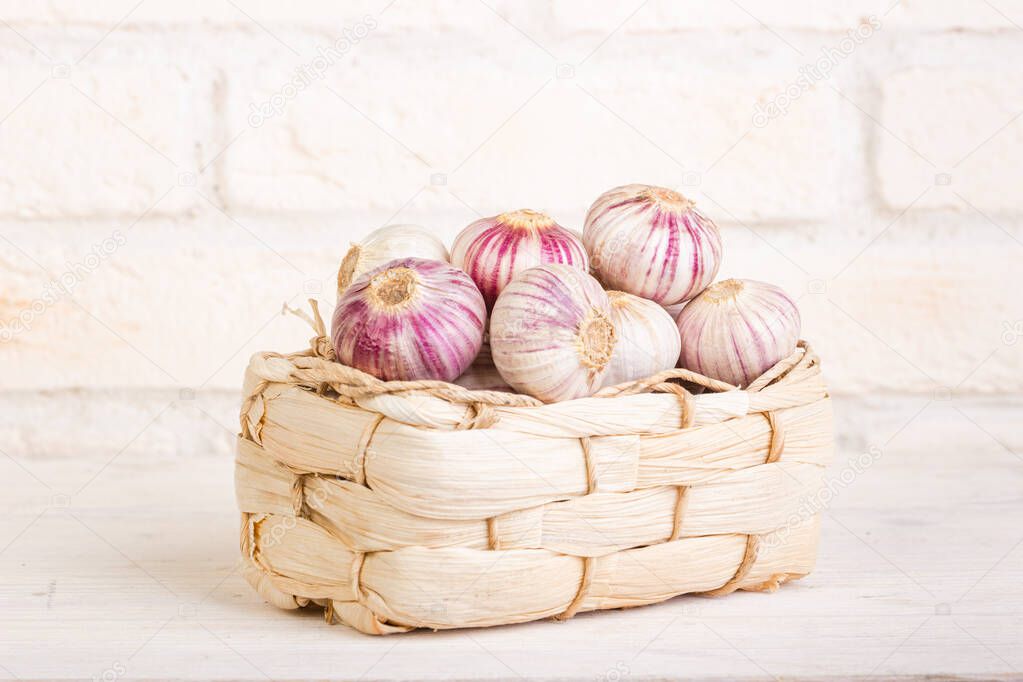 Garlic heads in a wicker basket